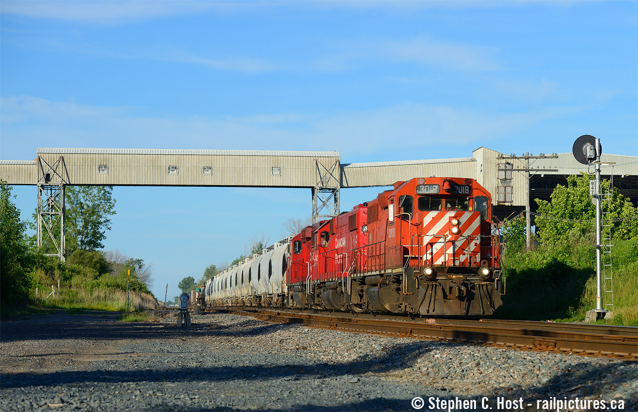 An iconic structure that's been trackside for decades is now gone: what I suspect is a conveyor structure between two Lafarge Cement plants (formerly Canada Cement) has been removed. It was a Great (Jason Noe) Prop (Mooney) over the years. I've been here a few times, shared this a couple years ago. Oh well, too bad, so marches father time. Get your shots!
I chased this T69 once from Puslinch to basically here, and didn't think I'd beat it... they must have stopped in Woodstock, because sometimes this train is a hard one to keep up with!