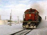 Freight train passing through La Broquerie MB headed South East toward Minnesota border