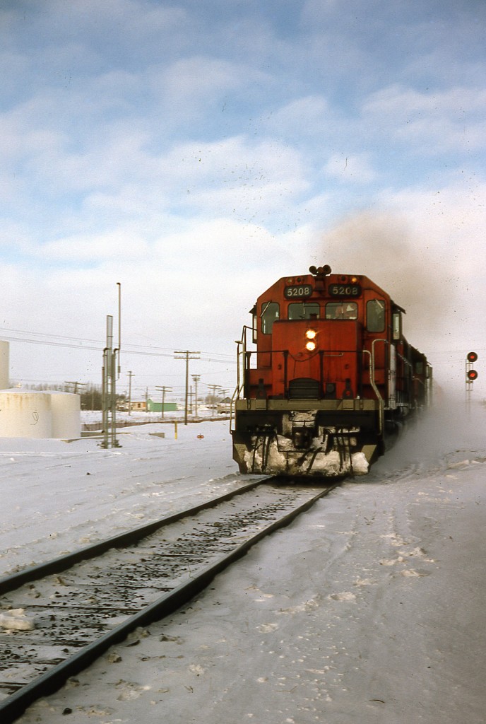 Freight train passing through La Broquerie MB headed South East toward Minnesota border