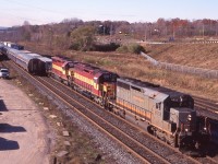 Probably one of my favourite CN 148's and also narrowly missed getting hosed by the Amtrak, LOL. Up front this day was former CN 5110, rebuilt to GCFX 6058, followed by WC SD45 6587, ex ATSF 5525/1825 and WC 7511, ex BN 6511. The train was rolling through Aldershot on its way to Brampton's intermodal terminal. I sure do miss the old EMD's especially the SD45's. A lot more variety back then.