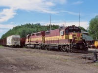 As a kid I only got to ride on the Algoma Central once, unfortunately I was too young to take any photos. I really liked the AC so in 2001 following the line on the way out west was a must. We managed to catch three Wisconsin Central trains this day and I'm happy I visited here before the CN takeover. This visit showed me a Hawk Junction that was just a shell of its former self, but still much better than it is today. Sadly the branch to the harbour was already gone by the time of my visit and the yard was fairly empty. We arrived the day after Canada Day and it was nice to see a Canadian flag still taped on the side of the trailing SD45, and catching an old GP35 on the head end was a nice treat as well. The crew were assembling their northbound train when we got there, but unfortunately did not stick around for its departure. 