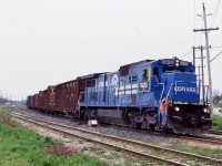 It is almost hard to believe now that there was a time when railfanning around the Niagara Region could keep a Railfan busy all day, even Niagara Falls was still a busy railroad town. Back in 2002 CN Niagara Falls yard was still a busy place, not just for CN but NS run-through trains as well. While the stack trains to Dain City were history, NS still had through trains 327 / 328 and the NS Buffalo to Niagara Falls turn job 445. ON this day venerable former Conrail Dash-8 8202 was pulling off the Stamford sub. at Cliffton and about to back into the CN yard. Sadly today these old Dash-8's are long gone along with CN's yard in the "Falls". Today NS only runs as far as Fort Erie, and trains 327 / 328 are history as well. 