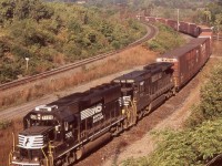 The NS GP60's were kind of neat, especially as I rarely caught one on this train. Here GP60 7128 works with a Dash-8 as they head along the cow path in Hamilton, and towards Buffalo. Today I believe most of the GP60's have lost their turbo chargers, as high horsepower four axle units never lived up to most railroads expectations. 