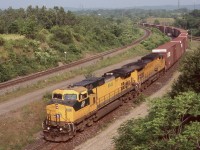 Probably my favourite catch on NS trains 327 / 328 from all the ones I saw. The later years of NS operations in Southern Ontario found a lot of foreign power kicking around. At the time I believe there were only 2 CNW painted Dash-9's left on UP's roster, so when word got out that the previous days 327 had this consist, I prayed the CNW would lead 328 the next day. As luck would have it things worked out as I caught it heading around the "cow path" at Hamilton West, and a lot of railfans headed out this day.
