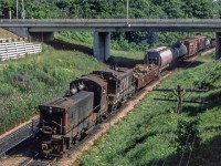 CN 1318 and CN 1319 are westbound approaching Bayview Junction, Ontario on July 21, 1980.