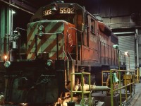 <br>
<br>
   GMD 1966 built CP Rail 5502  at the shop wheel lathe: the A truck leading axle wheels in process. 
<br>
<br>
   At CP Rail Agincourt, December 15, 1984 Kodachrome by S.Danko 
<br>
<br>
   Notable:
<br>
<br>
   In 1999 CP Rail 5502 sold to Helm Financial to HLCX 6314 
<br>
<br>

