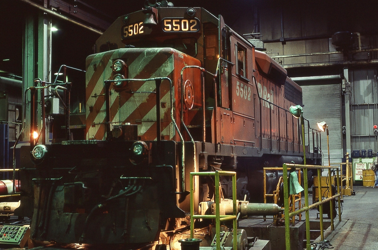 GMD 1966 built CP Rail 5502  at the shop wheel lathe: the A truck leading axle wheels in process. 


   At CP Rail Agincourt, December 15, 1984 Kodachrome by S.Danko 


   Notable:


   In 1999 CP Rail 5502 sold to Helm Financial to HLCX 6314