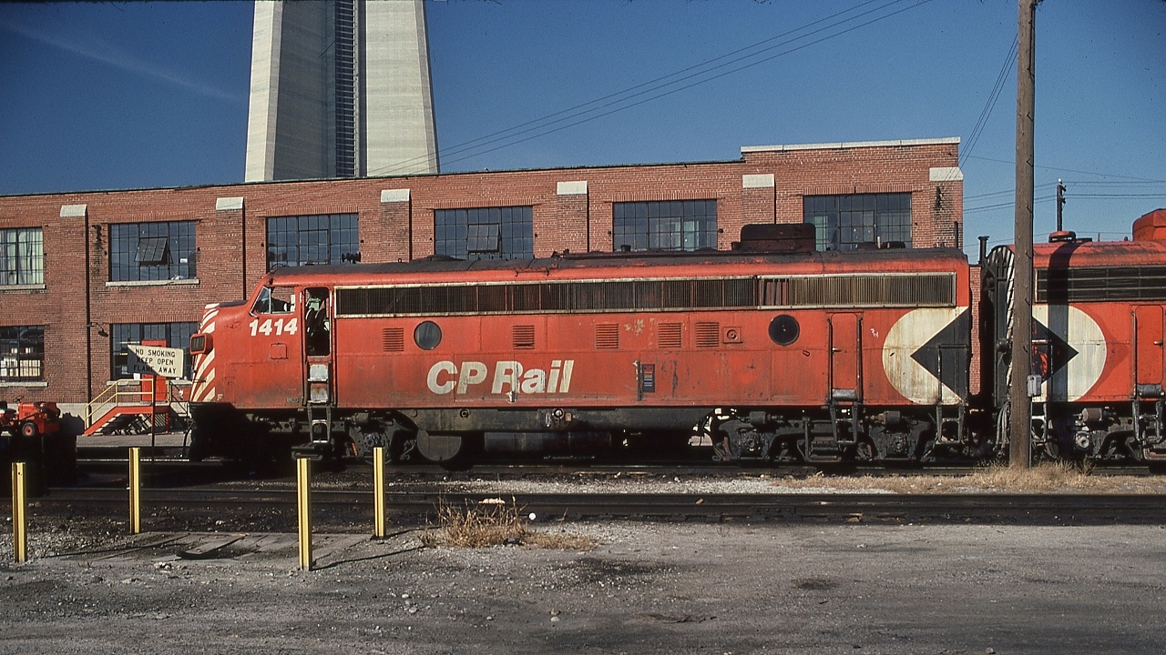 The first week of VIA CP Rail, and the lash up for the daily The Canadian is unique and different.


   Rather than the usual single 4000 series CP Rail  F unit, VIA expanded the daily  The Canadian  with a full summer season like consist, including an ex CN steam generator and an ex CN 52 seat deluxe Dayniter coach, requiring more ex CP Rail power to match:


   The lash up:  1414 – 4067 - 8479;  GMD 1954 built FP9A   -  GMD 1952 built FP7A  -  MLW 1955 built RS-10


    Near the CP Rail John Street fueling rack, with the CPR Locomotive and Car Stores building in the background, November 4, 1978 Kodachrome by S.Danko