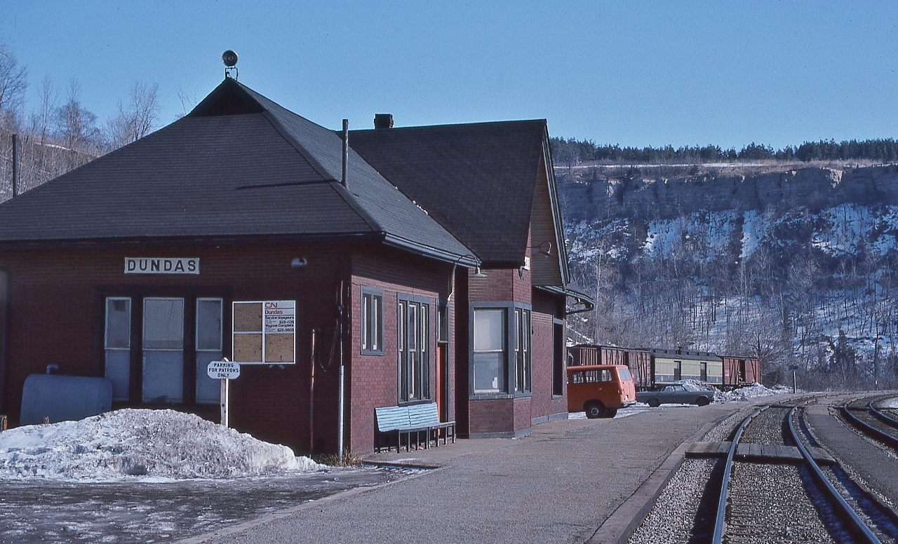 ...a quiet time at the station...other than Bayview Jct and Guelph Jct....then this was the place to be....


   seems to me that the CN work train equipment spent most of the winter on the Dundas station back track  


  In the background, is “THE BEAST”


    My 1965 Ford LTD hardtop powered by a 352 cubic inch V-8  


   At CN Dundas, February 19, 1977 Kodachrome by S.Danko


   Notable: In two months, changing the winter rear wheels & tires to summers, upon jacking up the rear bumper, the bumper and back end went up, the rear wheel did not.....cracked the frame behind the rear wheel, drove the Ford until that July....


  Interesting: not being a 'patron', yours truly parked on the far side of the station....is that a flood lamp on the station roof ?