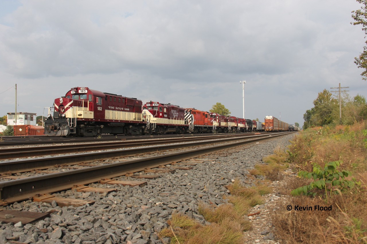 On September 24, 2020, CN was in charge of taking OSR (Ontario Southland Railway) equipment (locomotives and cars) from the Guelph Jct. Railway operations out of Campbellville (Guelph Jct.) to their shops in Salford, ON via the Guelph Sub. Over the summer of 2020, OSR equipment was purged from the Campbellville shops and sent up to Guelph, including some ex-BCR MLWs which would go to Quebec. August 28, 2020 was the last day of OSR running on the Guelph Jct. Railway; GEXR would take over the lines after that date. Since I was busy to get the movement between Guelph and Kitchener in the morning that day, I was hoping to catch up with the train west of Kitchener on its way to London. However, the train had some issues and the crew tied it down in Kitchener Yard. Definitely not the most photogenic location, but for me, it's either get fussy about location and don't shoot the train or get a shot of it. I opted for the latter because it was an interesting train to say the least.