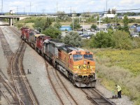 2021.09.06 BNSF 5423 leading CP 420 light power, QGRY 6908, CP 3113, CSX 305, CP 9366 and CP8120 trailing, at CP Agincourt Yard 