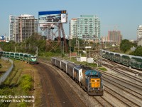 Gone but not forgotten, the Ontario Northland "Northlander" 1805 (GP38-2) leading, is approaching Union Station in Toronto, Ontario on 8/16/2010. The Northlander was discontinued on 9/28/2012. This view, from the Bathrhurst Street Bridge, is a classic railfan's spot, and was perfect for this warm summer morning.