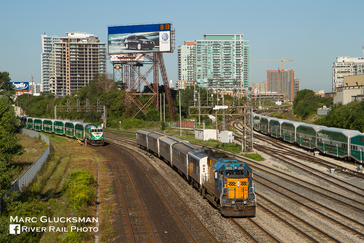 Gone but not forgotten, the Ontario Northland "Northlander" 1805 (GP38-2) leading, is approaching Union Station in Toronto, Ontario on 8/16/2010. The Northlander was discontinued on 9/28/2012. This view, from the Bathrhurst Street Bridge, is a classic railfan's spot, and was perfect for this warm summer morning.