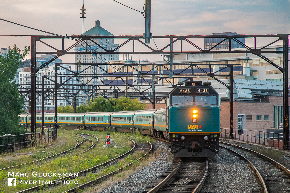 Heading to Halifax! F40PH-2 6438 leads the REI-weekly VIA Rail Canada Train 14 (Ocean) is departing Gare Central in Montreal, QC heading to Halifax, NS on the evening of Friday, August 24, 2018. The “Renaissance Class” cars were built by Metropolitan-Cammell in 1995-1996, and number 139 in the VIA fleet. The towers used to carry catenary for Canadian National before it was cut back to Gare Central.