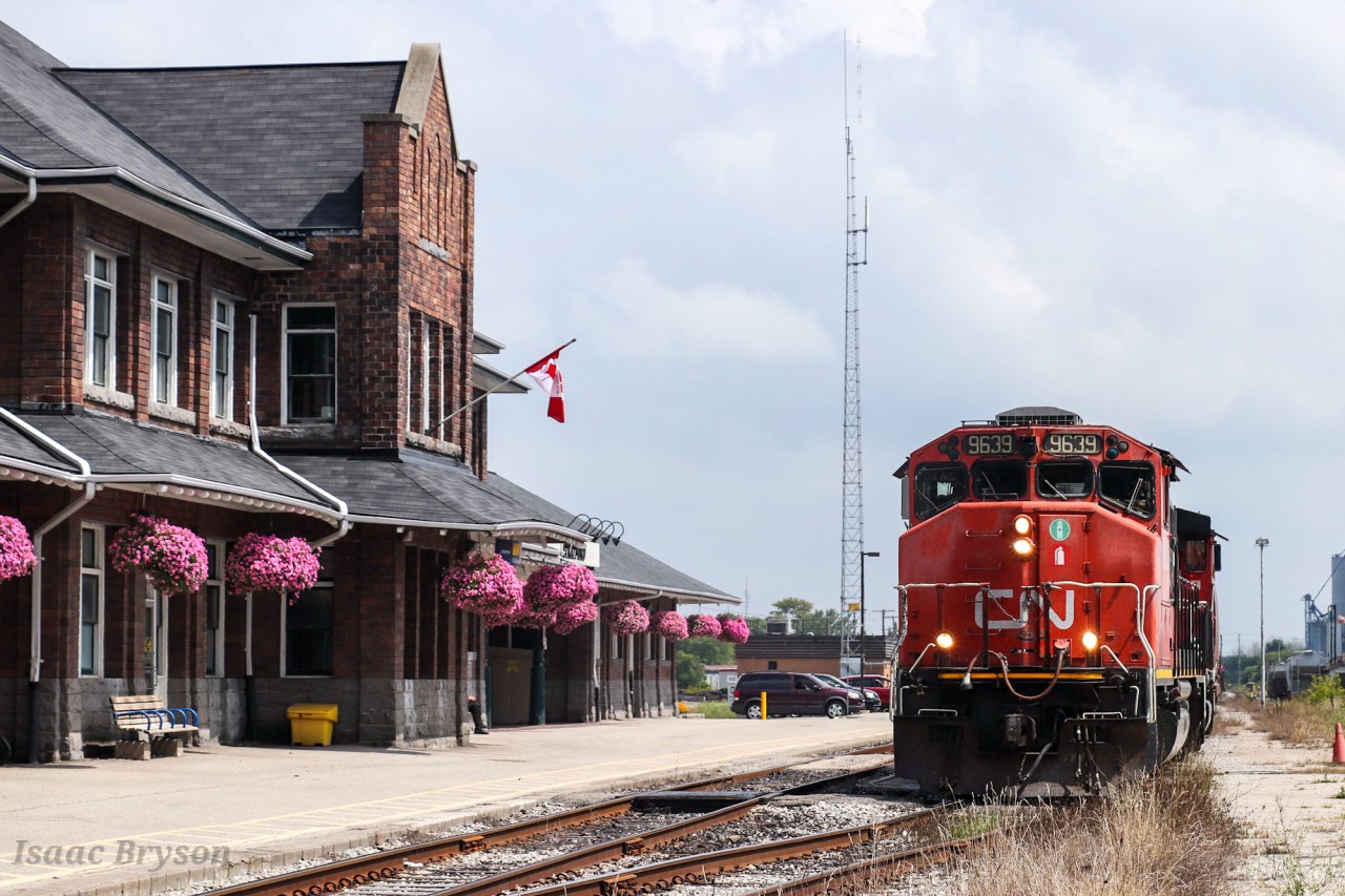 CN L56831 17 pulls out of the siding past the beautiful Stratford VIA station with CN 9639, CN 9449 and around 20 cars for various industries between Stratford and London.

Built in 1913 by the Grand Trunk, Stratford has seen Grand Trunk, CN, and now VIA trains stop at the station for the last 108 years. According to multiple new sites, GO will also begin service in Stratford in October 2021 as a pilot project for London-Toronto (and back) trains.