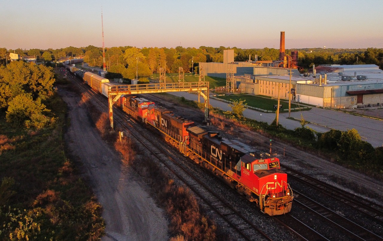 CN 399 catches the last of the suns rays on a lovely fall evening at Paris Junction.