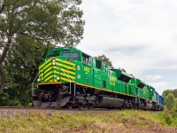 NBSR 6403 powers train 907 as they round the bend after heading through Westfield Beach, New Brunswick on an overcast Labour Day weekend.