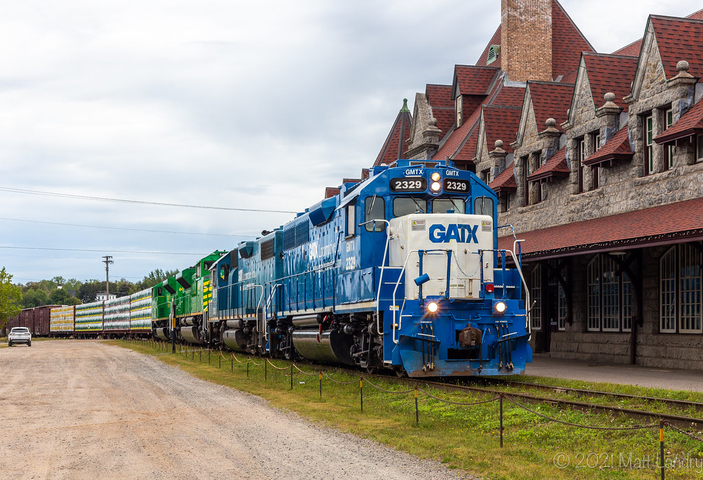 GMTX 2329 powers train 907 past the McAdam railway station. The power was wye'd at McAdam due to issues with the leading engine, NBSR 6403.