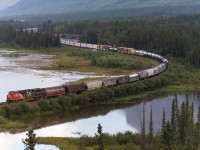 This is 774 departing Swan Landing.  This train is supposed to be sand empties, but it looks like they picked up some extra cargo on the head end.  Only a single locomotive on this train - think it was about 6500ft if I remember right.  