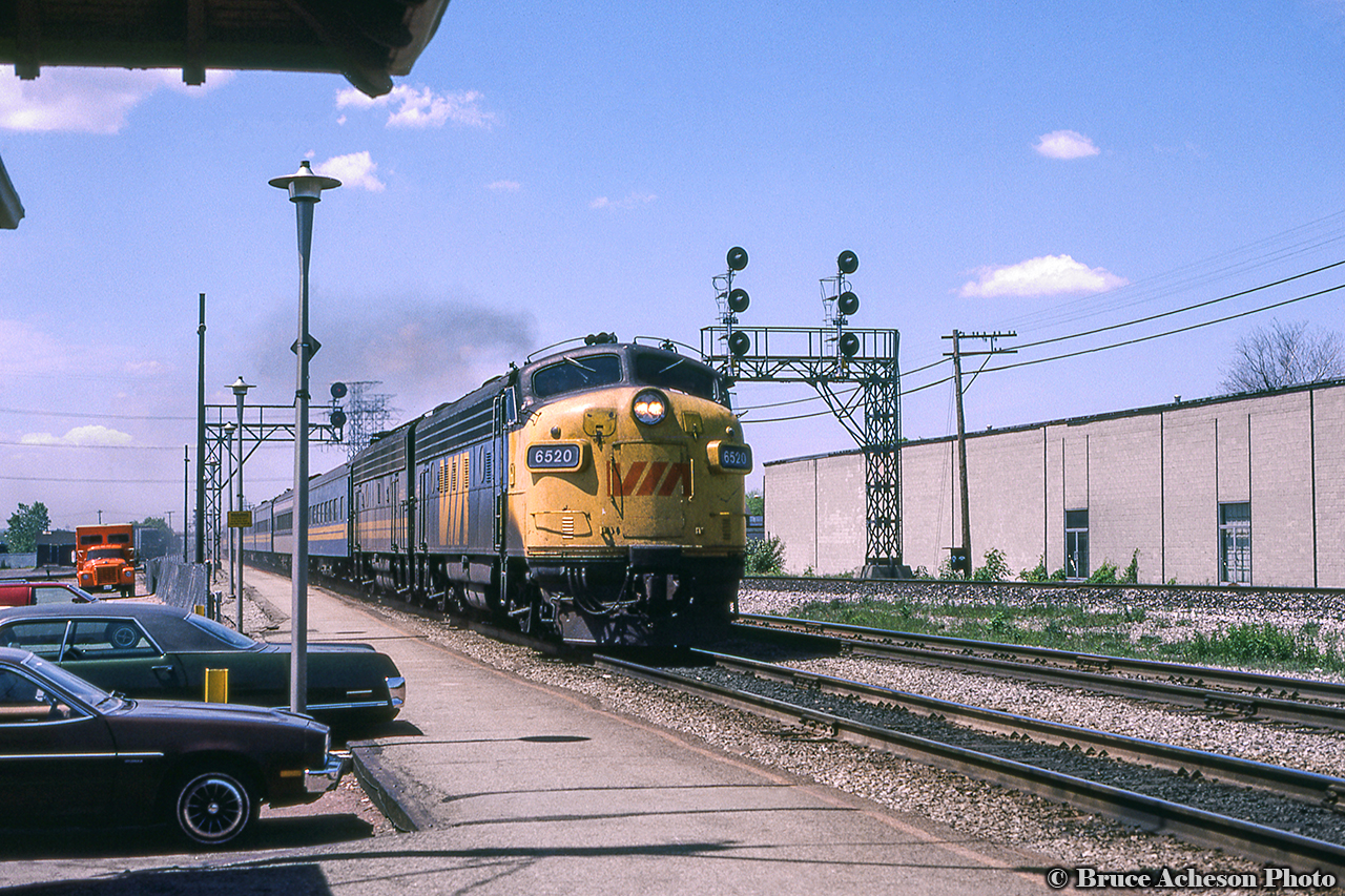 VIA Rail FP9A 6520 and a B unit sister bring eastbound number 72 into Burlington West station.  Built as CN 6520 in March of 1957, the unit would be transferred to VIA 6520 in March 1978, renumbered to VIA 6306 in June 1984 and finally retired from VIA service in 1994.  It would serve for three years with Les Trains Touristiques du Saint-Laurent (TTSL 6303) until May 1997, when it would move to Ontario as Waterloo-St. Jacob's Railway 6520.  After languishing in Toronto until 2012, it would finally make it's way west to the West Coast Railway Association's site in Squamish, British Columbia, where it was recently restored to CN's 1961 scheme.