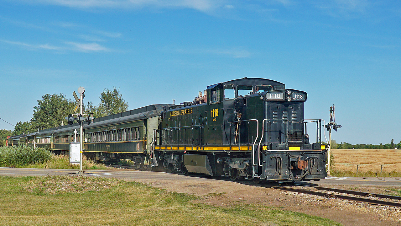 Alberta Prairie Railway's GMD-1m takes the evening dinner excursion south from Stettler to Warden.