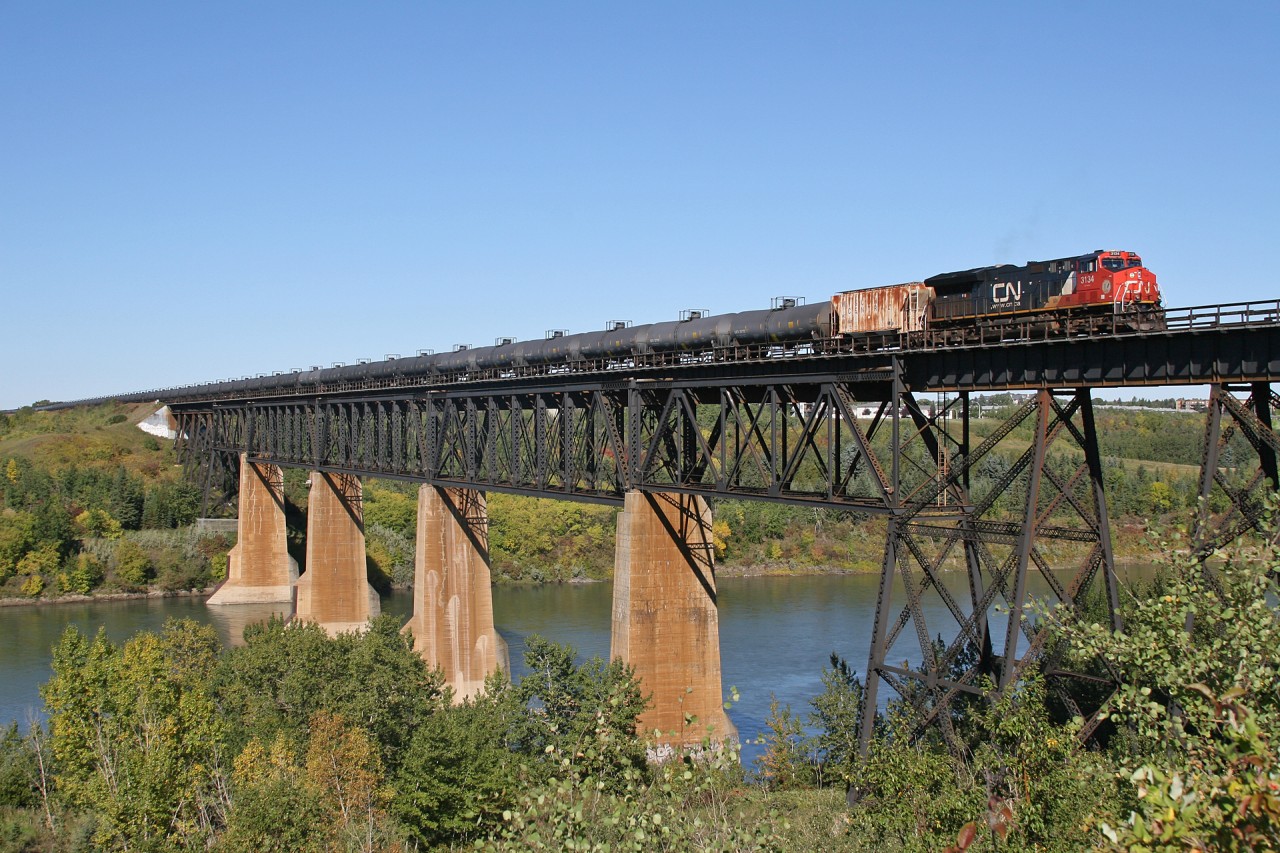 U 73581 11 soars over the North Saskatchewan River, bound for Bruderheim where it will be reloaded for another trip east