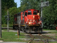 In a scene that could pass for two decades earlier, CN L568 returns to XV yard in Guelph crossing Edinburgh Road light power with GP9RM’s 4028 and 4116. CN L568 was returning after setting-off several boxcars at the WestRock of Canada facility on the North Industrial Spur in Guelph. 