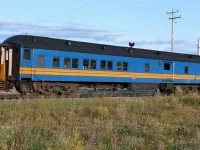 One of the more unusual cars that went up north to Waterways. According to the 1986 CTG, combine 7210 was built in 1919 by CC&F. I saw it twice the summer before and this once in 1986. The 1987 CTG shows it being retired/stored. The only VIA car that I recall or can find in my notes that was part of the Muskeg Mixed consist. Looking through the windows, it appears it is only being used to move large objects in its final days. The complete train consisted of the 4236 and 4345 up front, various freight cars, with CN baggage's 7855 and 7856, CN caboose 79101, VIA combine 7210 and CN coach 4977 at the rear. A piece of the 4977 can be seen, it is of 1924 vintage and spent time in Montreal commuter service. Photo taken with Kodak 100asa print film in the evening.