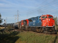 CN L 53852 16: CN 8952, CN 2666, CN 2279 departs the siding at Nashman with 108 cars for Walker Yard.