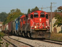 CN L568 heads westbound through Baden on the Guelph Subdivision with 4028, 4116, 4726 and GMTX 2163. 

