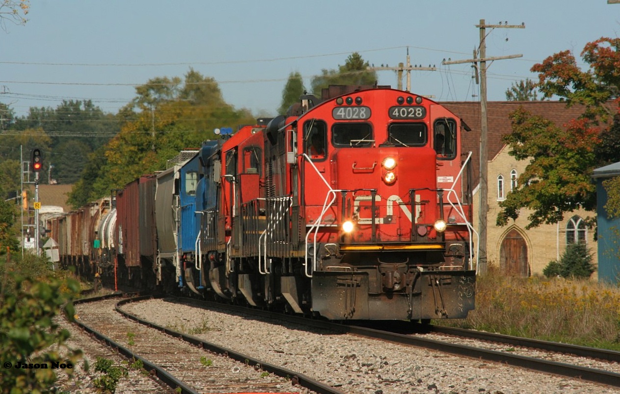 CN L568 heads westbound through Baden on the Guelph Subdivision with 4028, 4116, 4726 and GMTX 2163.