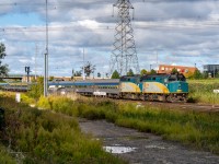 While it provided a nice background, the weather was causing challenging shooting conditions during the shove for VIA #1 onto York 1 at Snider. Once clear of the signal, the train will proceed eastward towards Doncaster, where it will proceed northward. Ahead of the (mostly hidden) baggage car were 5 deadheading cars; a coach, two Manors and two Skylines.