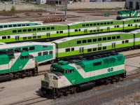 Among the sea of coaches in the modern 2-tone green scheme, 3 F59PHs sit awaiting their next duties in GO’s Willowbrook Yard. The 557 pictured here is facing west from being an assigned switcher but would take a trip around VIA's wye later in the day to face east for a return to service.