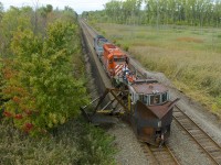 Work 5999 with CP 5999 and CMQ 9020 is spreading along the south track of the Adirondack Sub with spreader CP 402898.