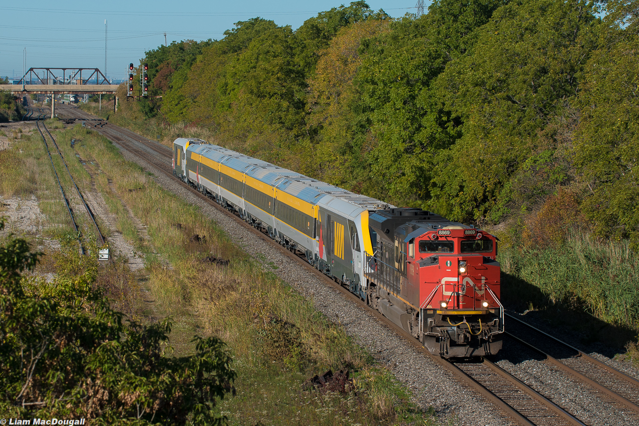 Railfans & Travellers alike have got a lot to be excited about right now, as VIA’s first Siemens-built trainset has been completed and is currently enroute to Montreal for testing. Here it is passing Oshawa in some sweet morning light being transported by a CN SD70M-2. The ID for this train was interestingly P698, a rarely used passenger train symbol rather than an extra freight symbol, I wonder why that is.
