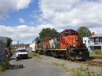 After waiting on the Turcot Holding Spur for a few trains to pass, the Pointe St-Charles Switcher is on its way back to the yard with CN 4141, CN 4808, two cars and shoving platform CN 79834.