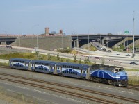 EXO 1211 has AMT 1343 and 3 multilevel cars as it passes the Turcot interchange. With new schedules posted by EXO at the end of August, a third departure to and from Mascouche was added and Mascouche trainsets went from 4 or 5 cars to 3.