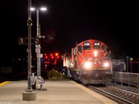 CN 4102 leads a triplet of GP38s on L549 as they head northwest through Weston GO in the darkest hours of the night with Mac Yard interchange traffic from the CP at Lambton. As much as I have a dislike for the look of many new GO Stations, the LED platform lights make night shooting much more bearable.