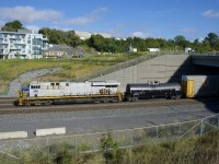 CN 3916 brings up the rear of CN 322 as it heads to Southwark Yard.