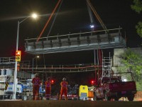 The replacement of the Metrolinx Guelph Subdivision bridge over the Speed River in Guelph – affectionately called Allan’s Bridge by locals for the old mill nearby – is well underway as the first replacement span is lowered with care and precision by the diligent crews of Mammoet, time 4:17am. After careful alignments and minor adjustments were made the span touched down at 4:56am.<br><br>Over the coming weekends all seven main spans – each weighing in at 200,000 lbs – and transverse members installed in 1948 by the Canadian Bridge Company of Walkerville, Ontario, will be replaced to extend the life of the bridge, allowing for increased speeds and future double tracking. The new bridge will rest upon the original 1856 limestone abutments and piers constructed by the Grand Trunk Railway – still in solid shape at 160 years of service.<br><br>A shot of the spans being replaced by the Canadian National Railway in 1948 can be found here in the <a href=https://guelph.pastperfectonline.com/photo/01D08C13-4810-4658-938F-528612368019>Guelph Museums' Collection.</a>