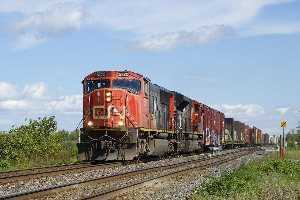 CN 5770 & CN 8927 lead a 512-axle CN 377 past the hotbox and dragging equipment detectors located at MP 29.2 of the Kingston Sub.