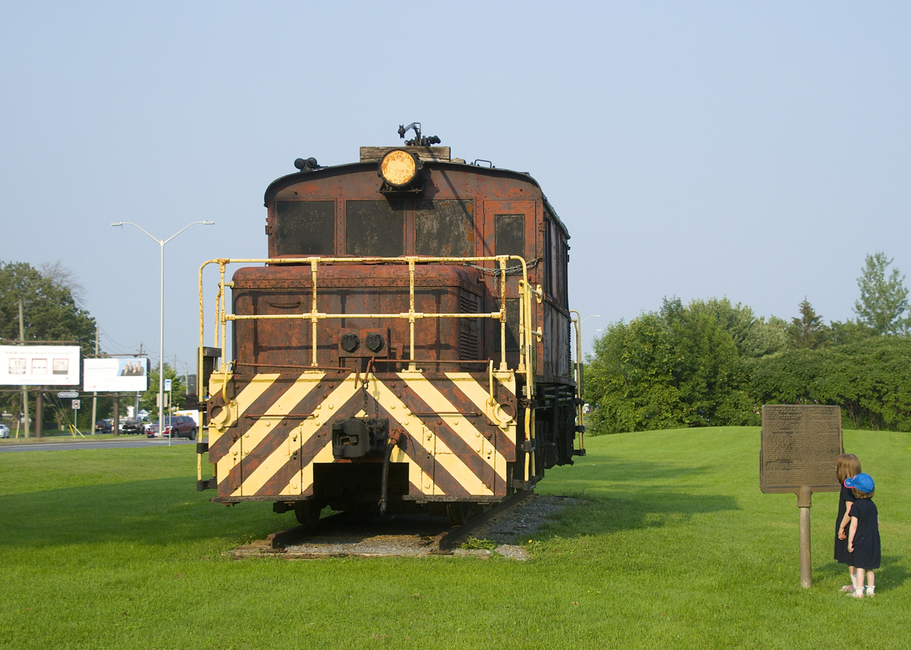 My two daughters look up at the preserved electric steeplecab preserved in a park in Cornwall. It was operated in Cornwall between 1963 and 1971 by the Cornwall Street Railway, which was taken over by CN in 1971. It was built in 1930 for the Salt Lake & Utah Railway. It is supposed to be moved to the Railway Museum of Eastern Ontario in Smiths Falls in the near future.