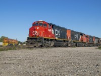 After spending some time working the Huron Park spur, L568 returned to Kitchener yard to lift the set of GP9s for the run to Kelly's.  Here the full set is seen working Stratford Yard, pulling a cut of potash cars out of the old Buffalo Yard tracks while power for the GEXR Goderich operation: GEXR 2073, RLHH 2117, rests on the service track.