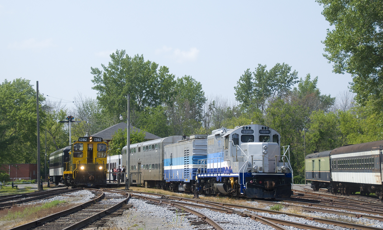 Most of Exporail's preserved AMT equipment is coupled together as CN 1382 prepares to lead an excursion train from Hays Station.