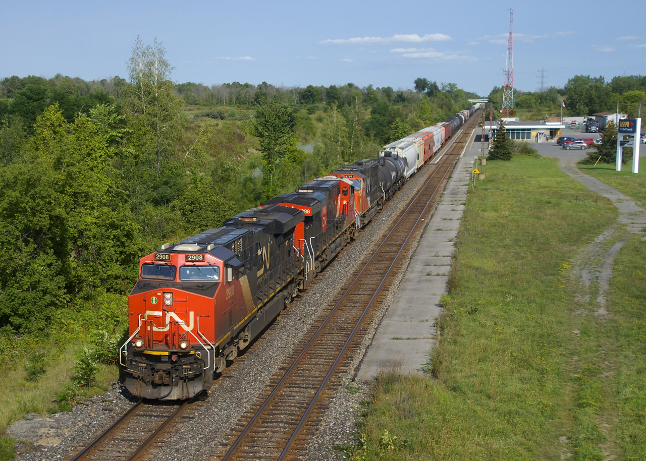 CN 377 has CN 2908, CN 3888, CN 5797 and 127 cars as it passes Cornwall Station. Further back in the train is one string of TankTrain cars, which will be set off at Brockville.