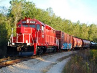 It seems as though the earlier I show up to photograph Trillium the earlier they've already started working.  JLCX 3502 has finished switching at Feeder Yard and is shown departing east at 7:23 a.m.  Where they head to next is anyone's guess when they've got a boxcar for St. Catharines, two hoppers for Port Colborne, and tank cars for Dain City.  They often switch WH Yard next, which they did this day, and then they proceeded to Dain City to switch tank cars for hours.  Since I was after TRRY 108, I didn't feel like waiting around.  A check back at the Trillium operations base at Feeder found TRRY 1859 and 108 behind a blue flag and getting some maintenance attention, so it didn't look like there would be a second job going on duty.  