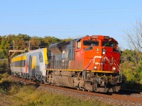 2021.09.29 CN 8869 leading CN P698, VIA 2201, VIA 2600, VIA 2700, VIA 2900, VIA 2800, VIA 2300 and VIA 2201 trailing. Rounding the curve at Mile 15 York Sub.