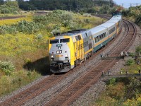 VIA 909 heading through Lovekin, Ontario, at around Milepost 284, on a nice September afternoon. Carrying 5 LRC cars on its way to Toronto with VIA 6404 at the rear. 

