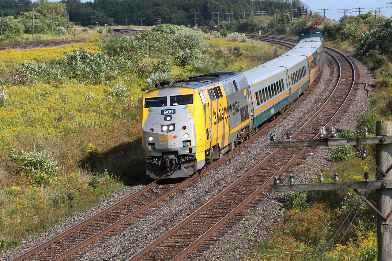 VIA 909 heading through Lovekin, Ontario, at around Milepost 284, on a nice September afternoon. Carrying 5 LRC cars on its way to Toronto with VIA 6404 at the rear.