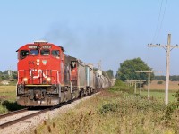 Looking more like a granger, surrounded by fertile farmers fields and elevators in the background. CN 568 storms westward out of the dip at Shakespeare after serving a local elevator. The sight of two GP40's working together on a local in 2021 is not such a common sight, so very much welcomed this day. The train has been well delay this day by track work west of Kitchener so will need a fresh crew before departing Stratford for Kitchener.  